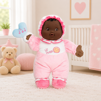 Plush baby doll in pink outfit with heart design in a nursery setting
