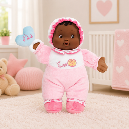 Plush baby doll in pink outfit with heart-themed background