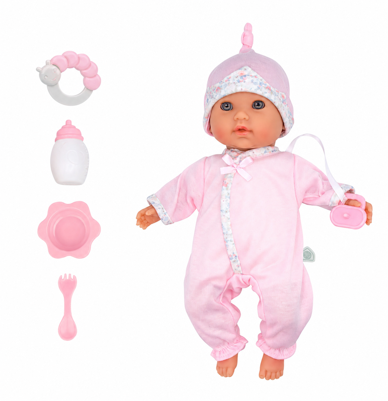 Baby doll in pink outfit with accessories on a white background