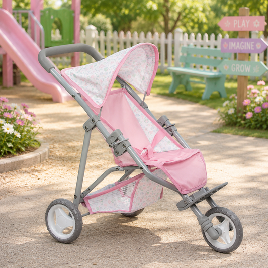 
A folding deluxe jogger for dolls, predominantly pink with gray accents, featuring a floral pattern and a sunshade.